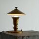 Art Deco table lamp in patinated brass from the 1940s.