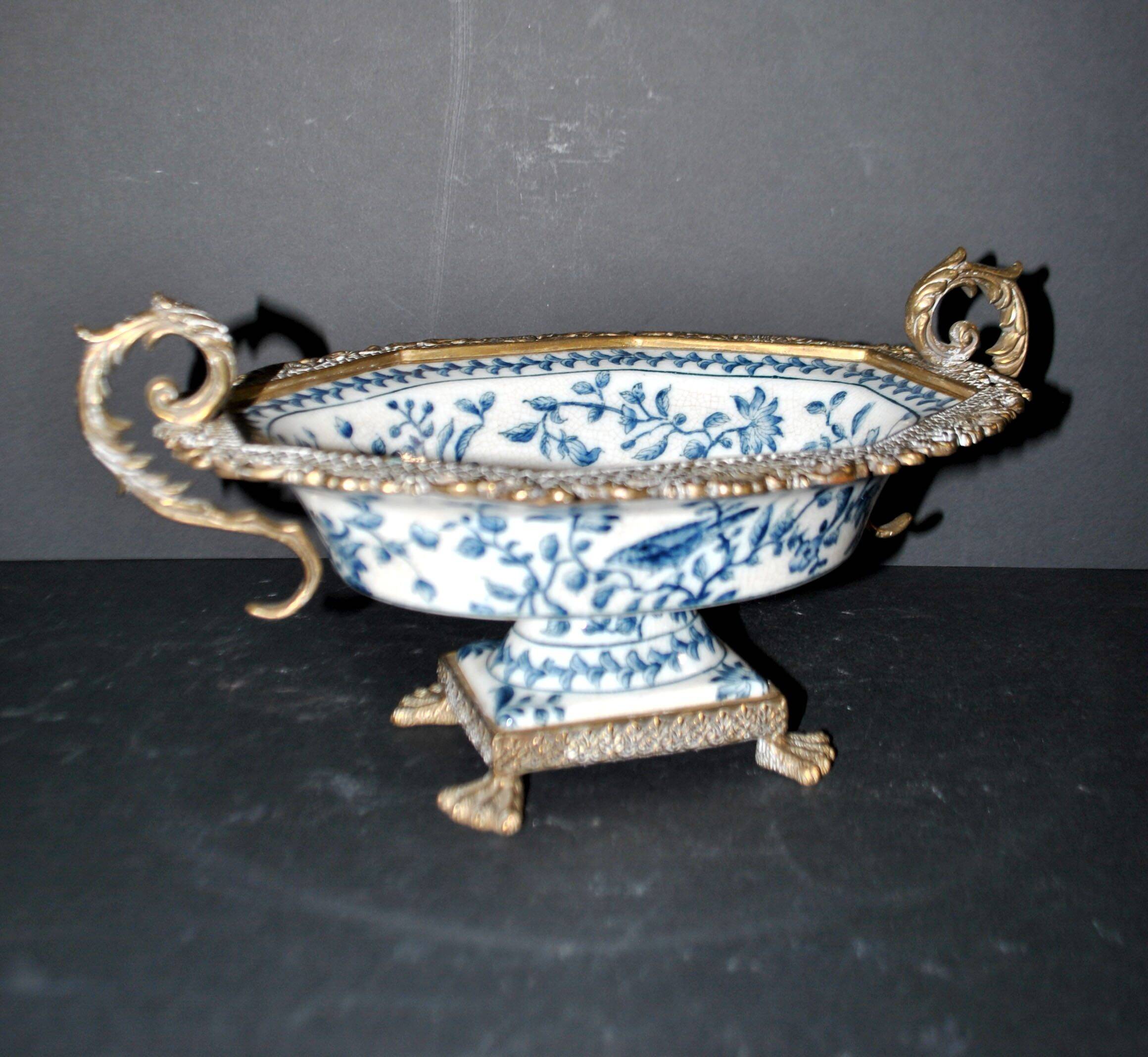 Blue Chinese floral porcelain coupe on a bronze base table centrepiece.