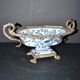 Blue Chinese floral porcelain coupe on a bronze base table centrepiece.