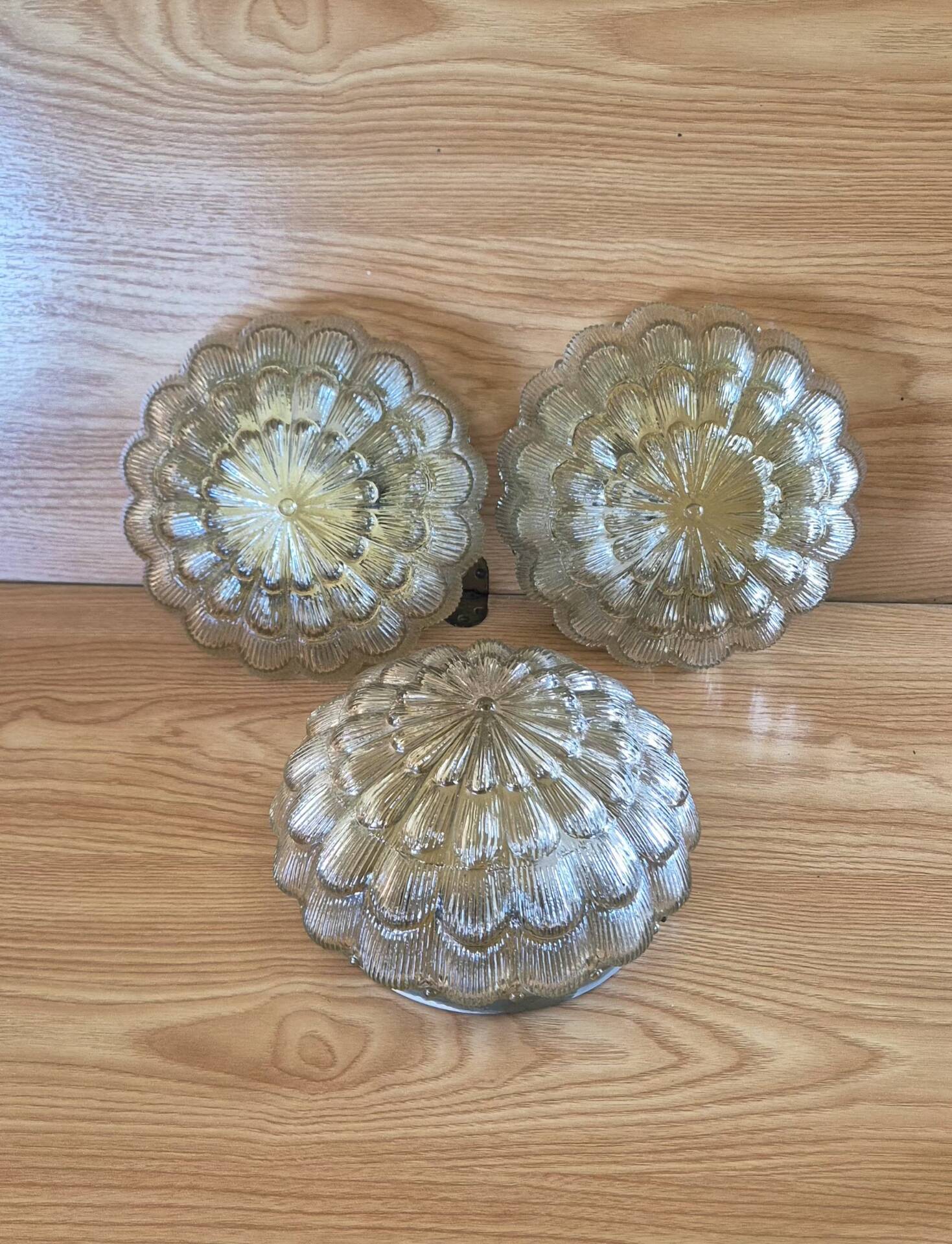 Set of 3 vintage amber moulded glass wall lights and ceiling lights.