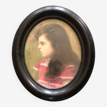 Old portrait of a young girl oval view