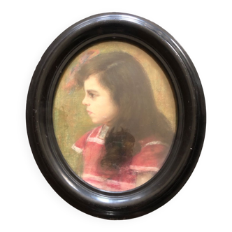 Old portrait of a young girl oval view