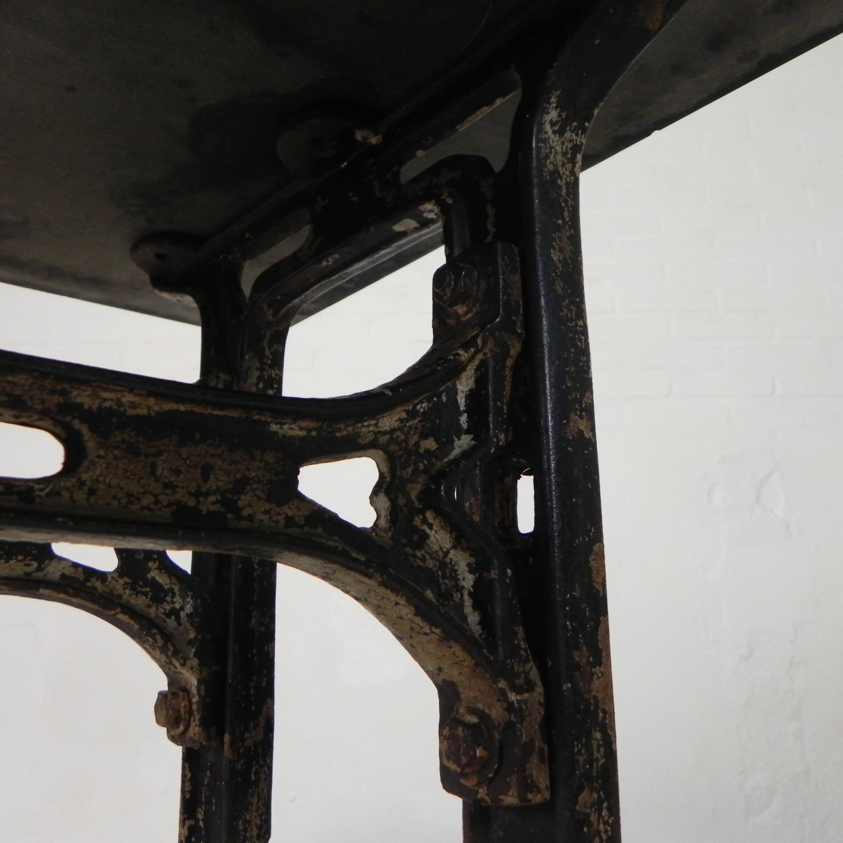 Industrial table, garden table with hard stone slab on cast iron frame, 1930s