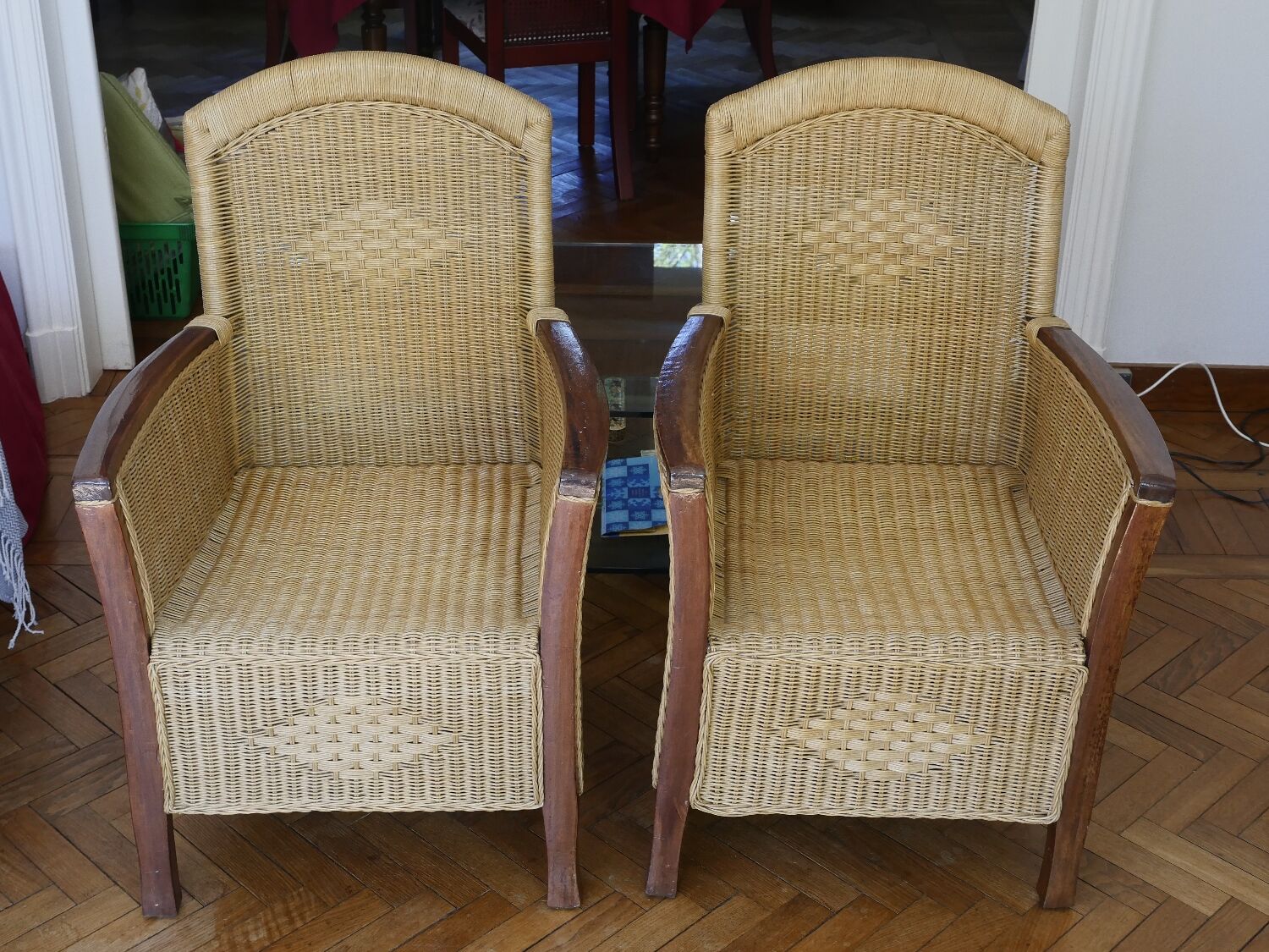 2 rattan and wood armchairs