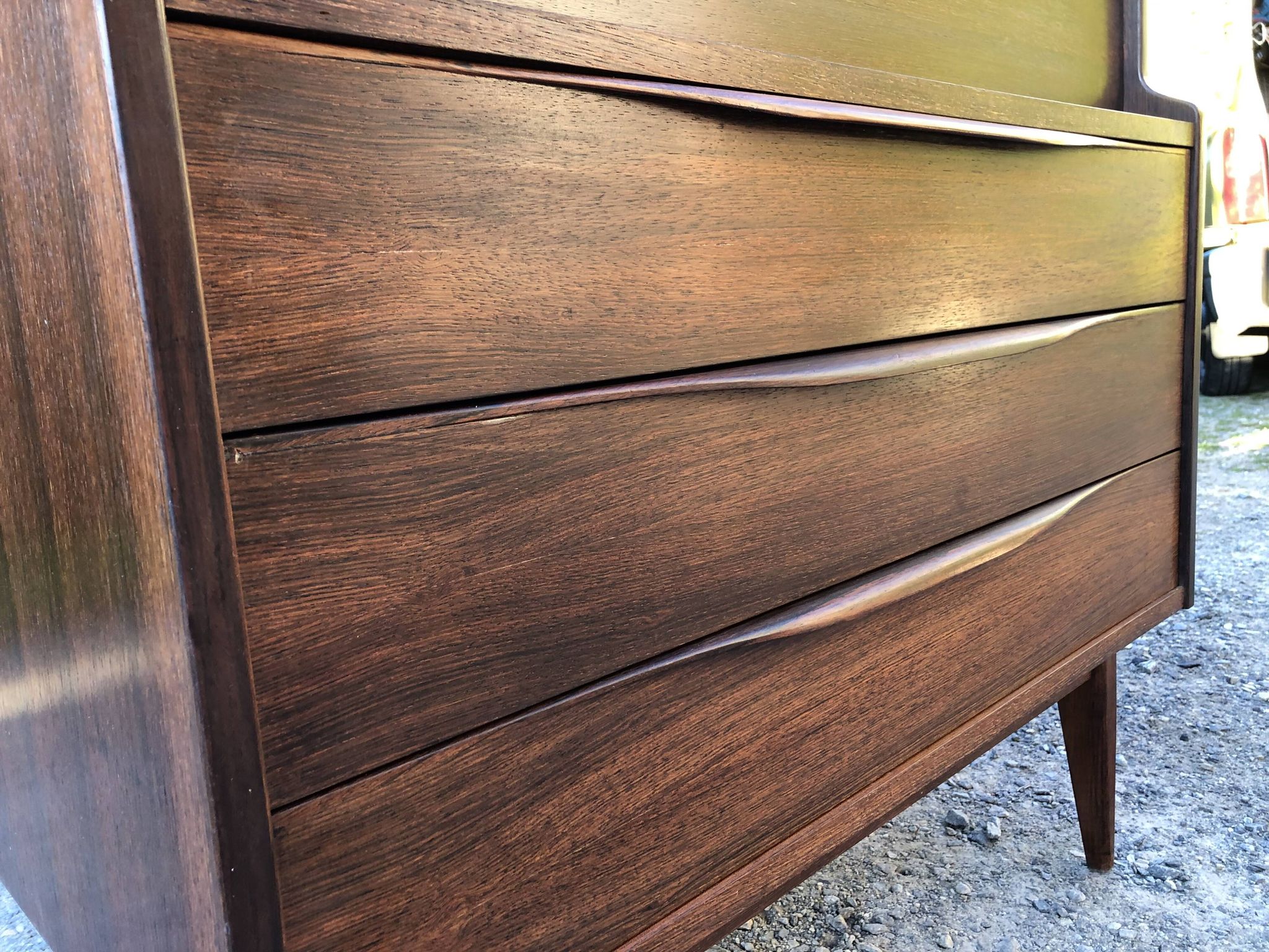 Vintage Scandinavian secretary in rosewood with drawers featuring fin-style handles.
