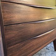 Vintage Scandinavian secretary in rosewood with drawers featuring fin-style handles.
