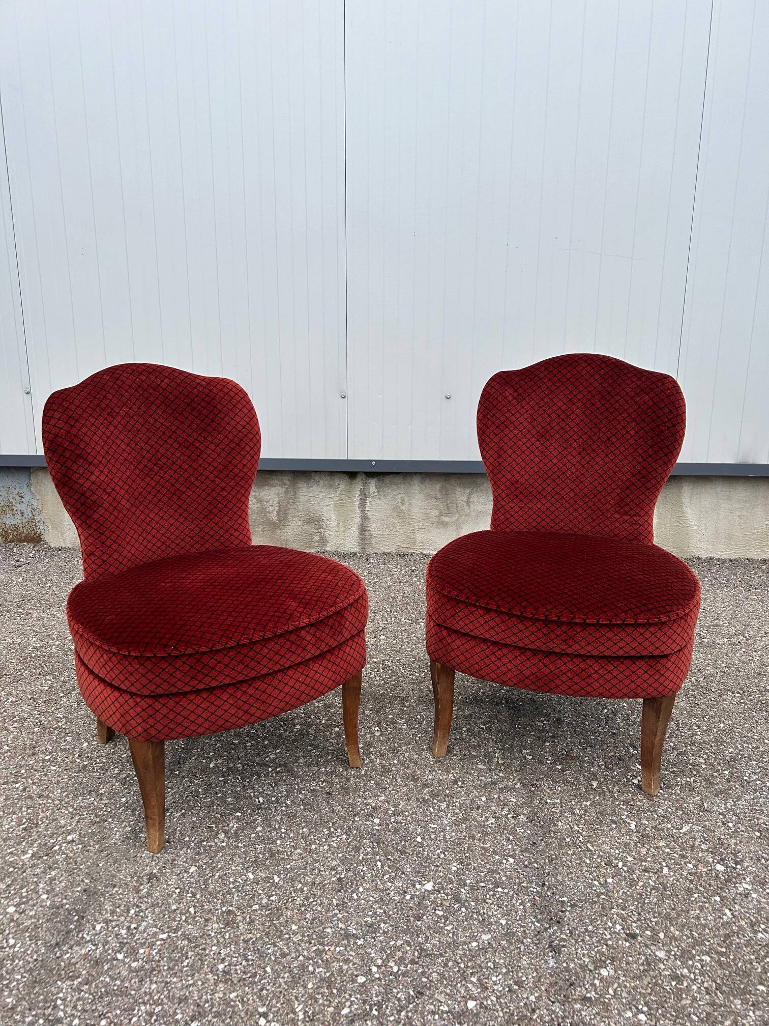 pair of red velvet toad armchairs