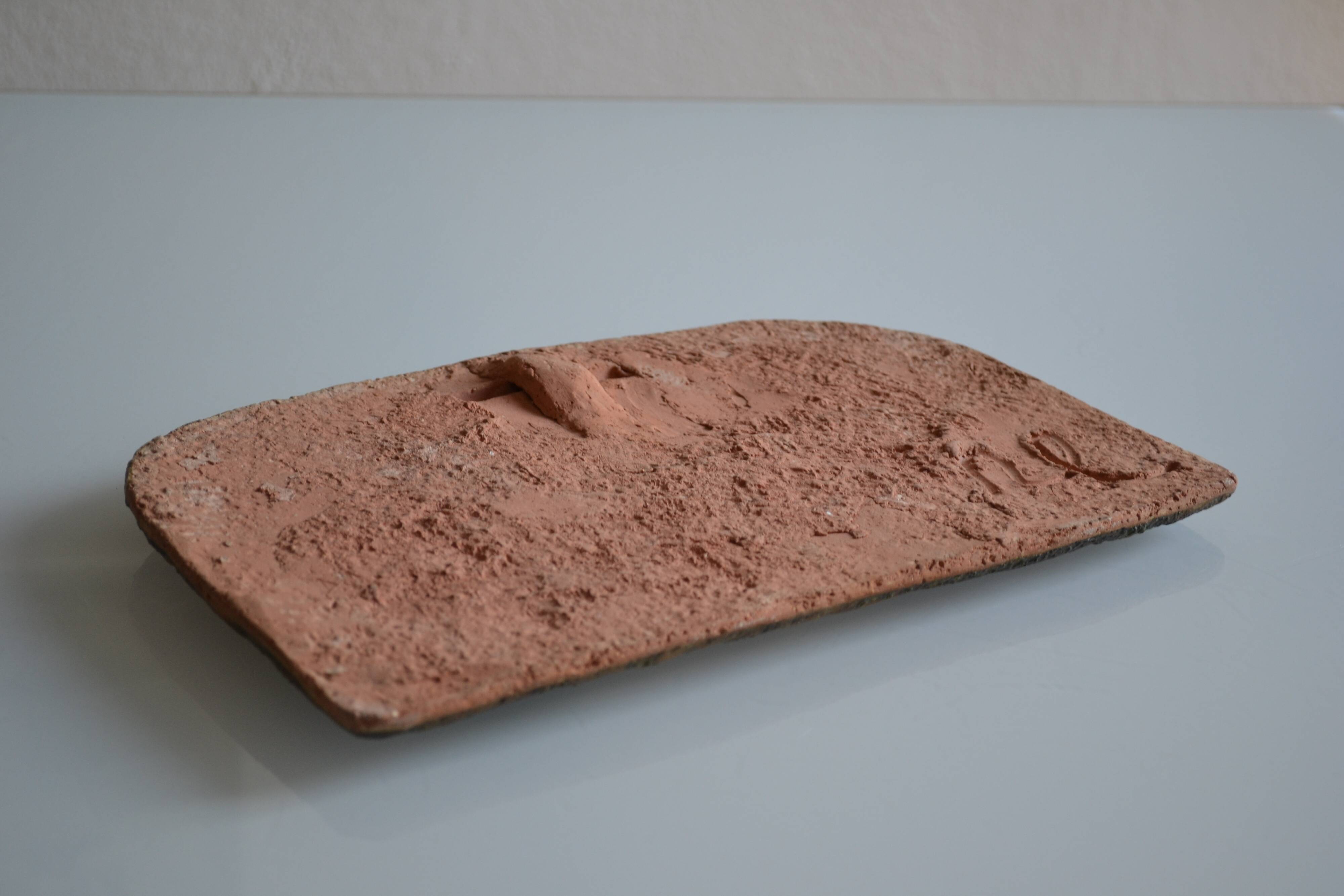Bas-relief sculpture in terracotta inspired by the Celtic bestiary