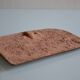 Bas-relief sculpture in terracotta inspired by the Celtic bestiary