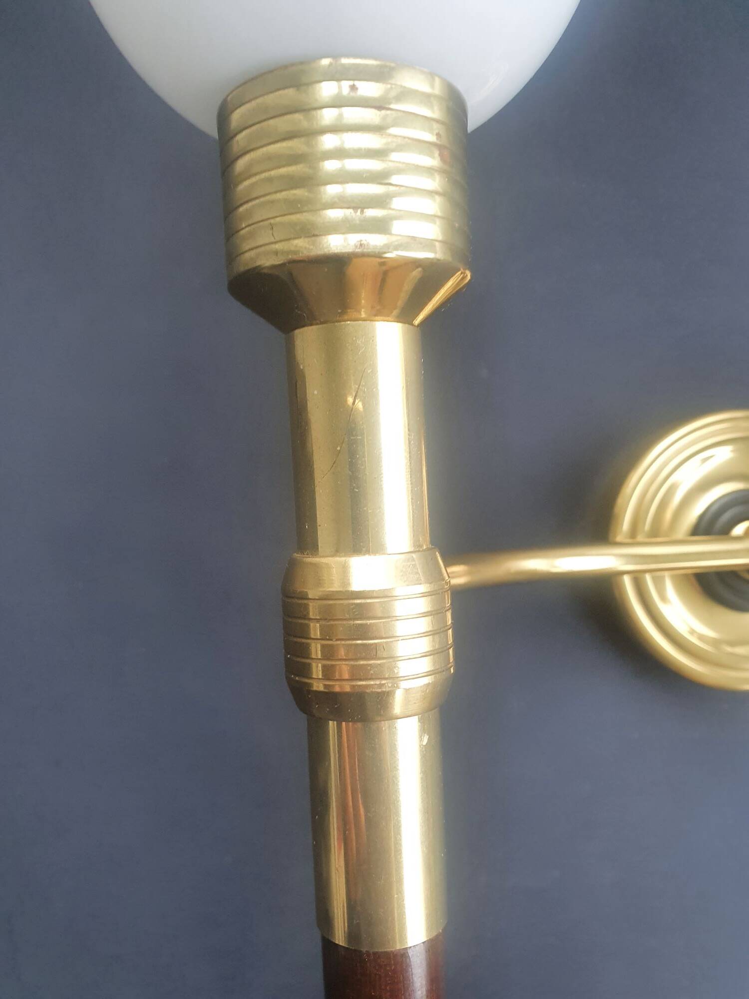 Large wall sconces torch style from the 1950s.