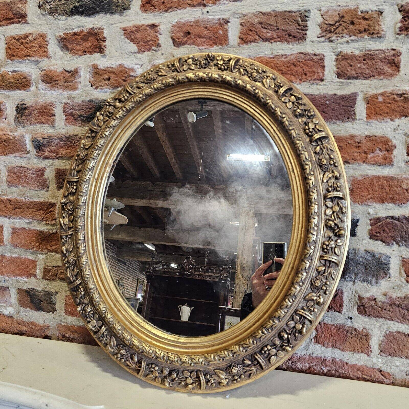 Small oval mirror