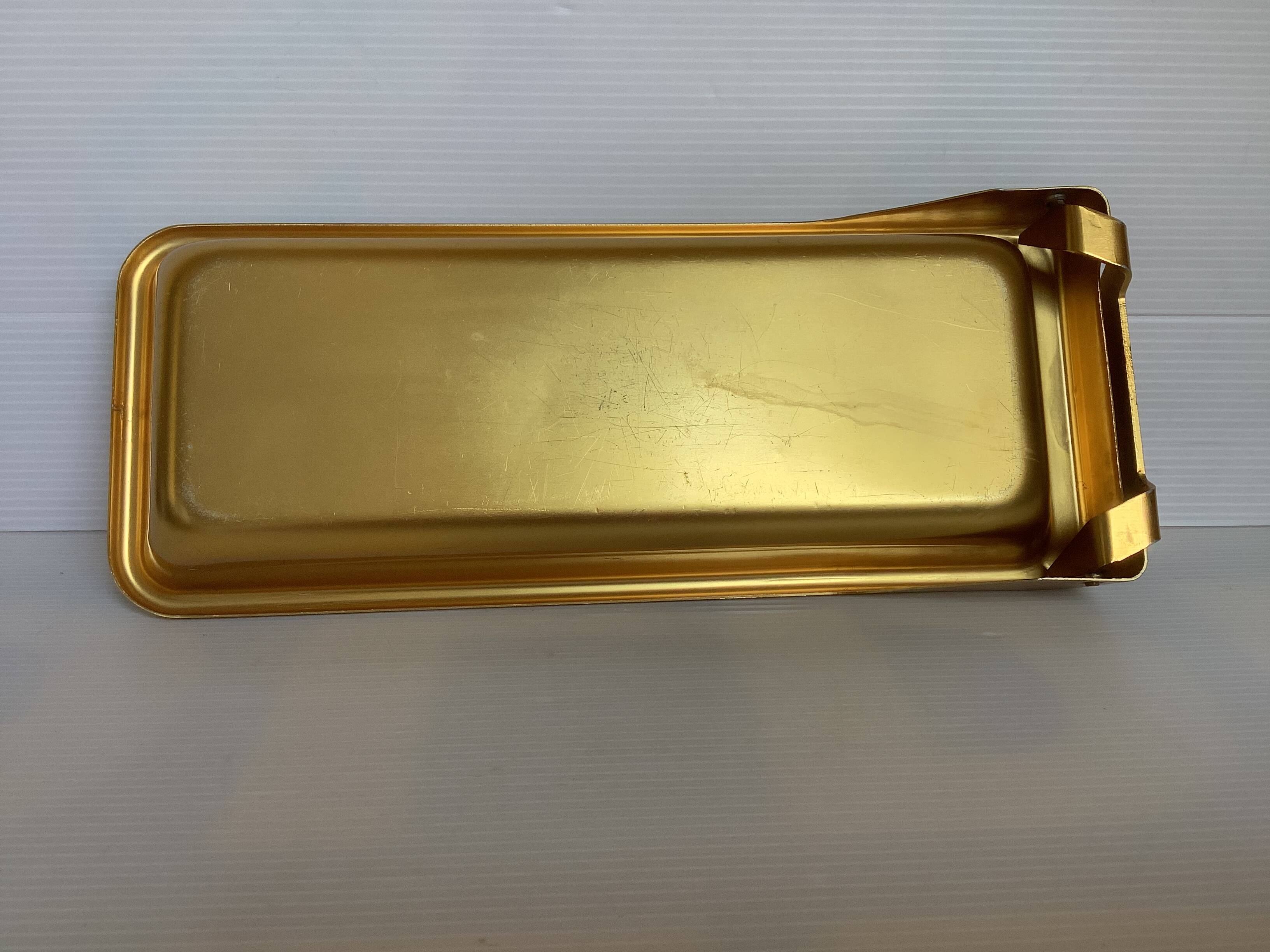 Old gold metal ice cube tray
