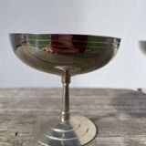 10 stainless steel cups signed Rémy Letang