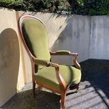 Fauteuil Voltaire XIX ème siècle, en noyer d'époque Louis Philippe, récemment recouvert.
