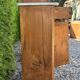 Antique wooden bedside table with marble