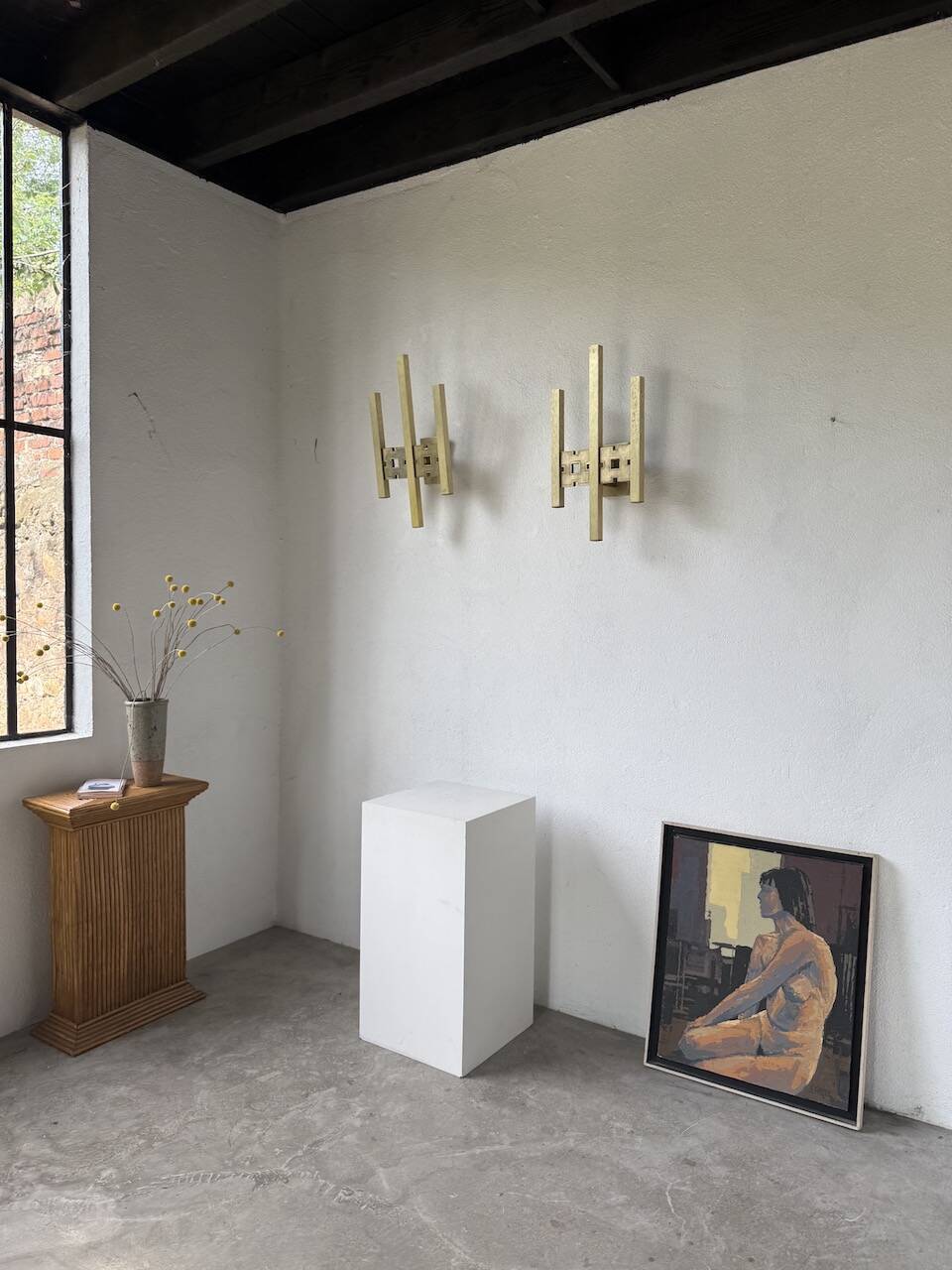 Pair of Regency brass wall lights in Italy