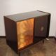 A vintage cabinet with a record player and a bar, 1960s.