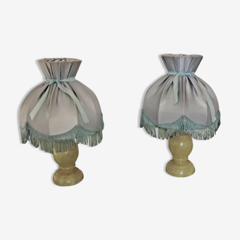 Pair of marble bedside lamps with blue satin fringed shades