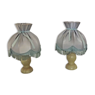 Pair of marble bedside lamps with blue satin fringed shades