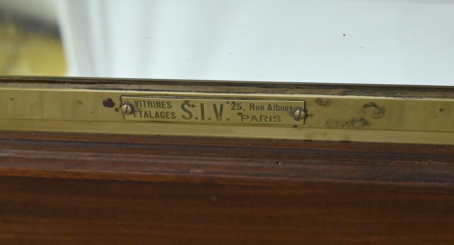 Brass display cabinet with a mirrored back – early 20th century