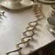 12 vintage gilded gold metal lion animal knife holders