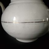 White enamelled sheet metal teapot