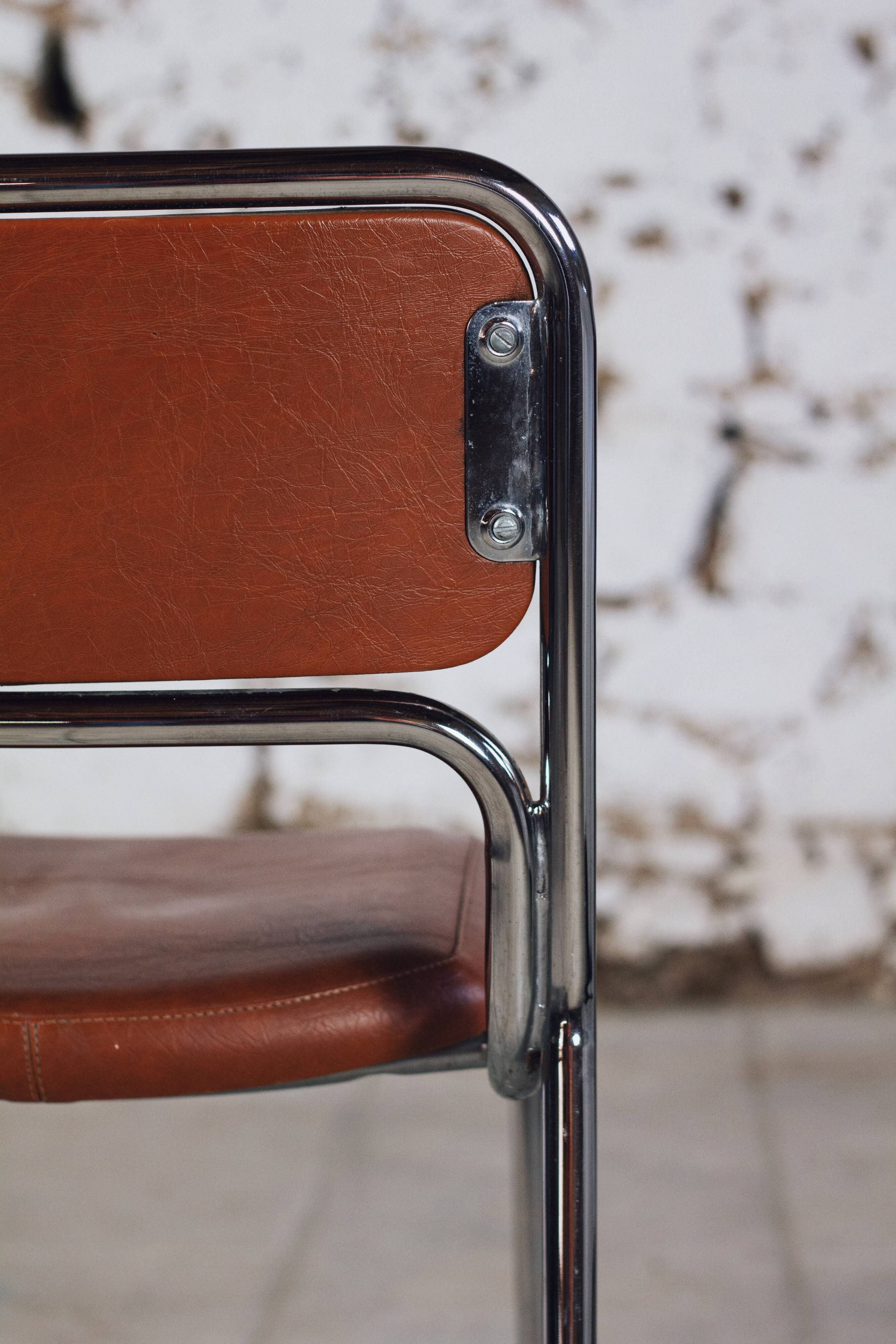 8 vintage tubular chrome and skai chairs, 1970