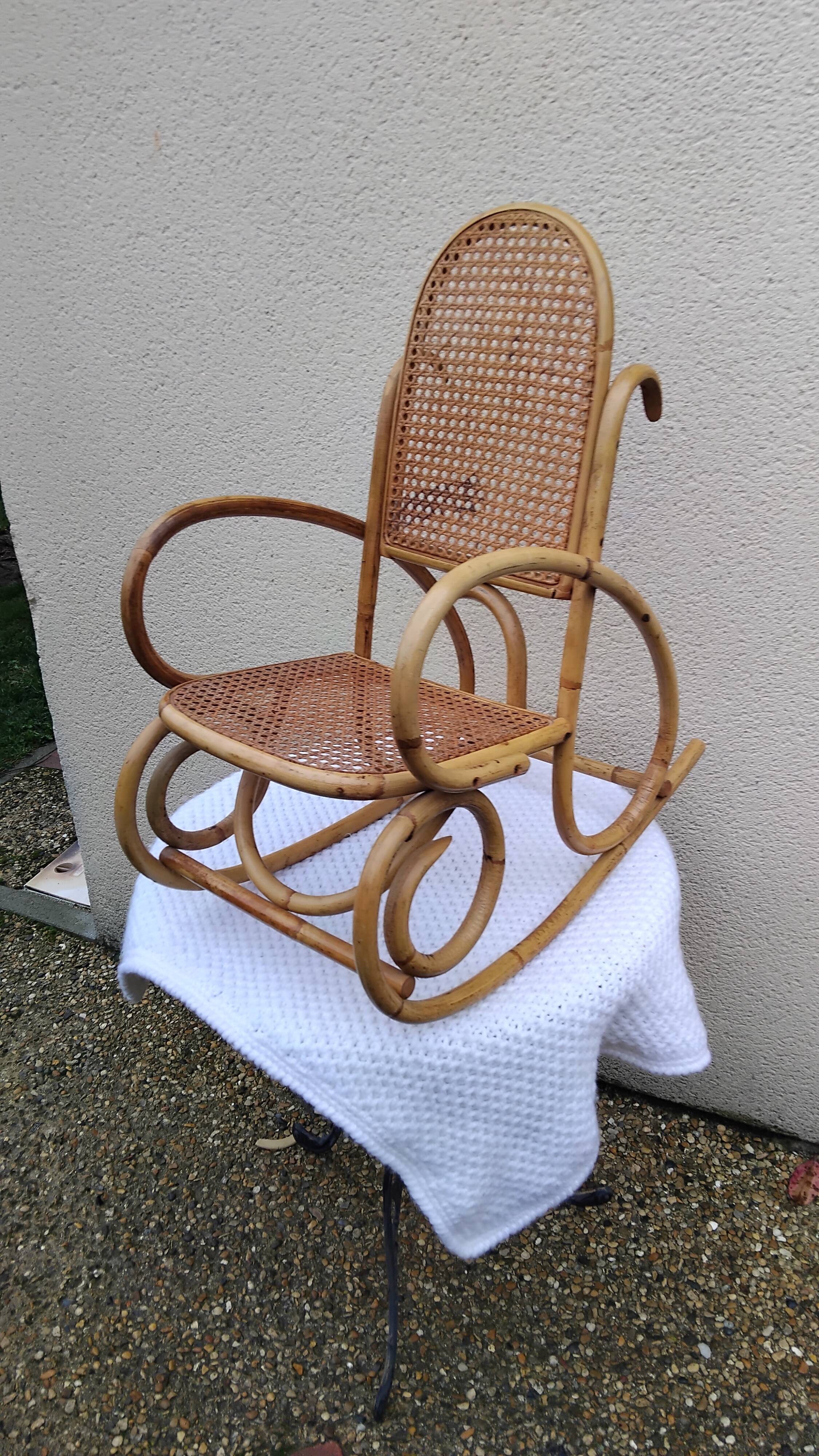 Vintage rattan and bamboo children's rocking chair