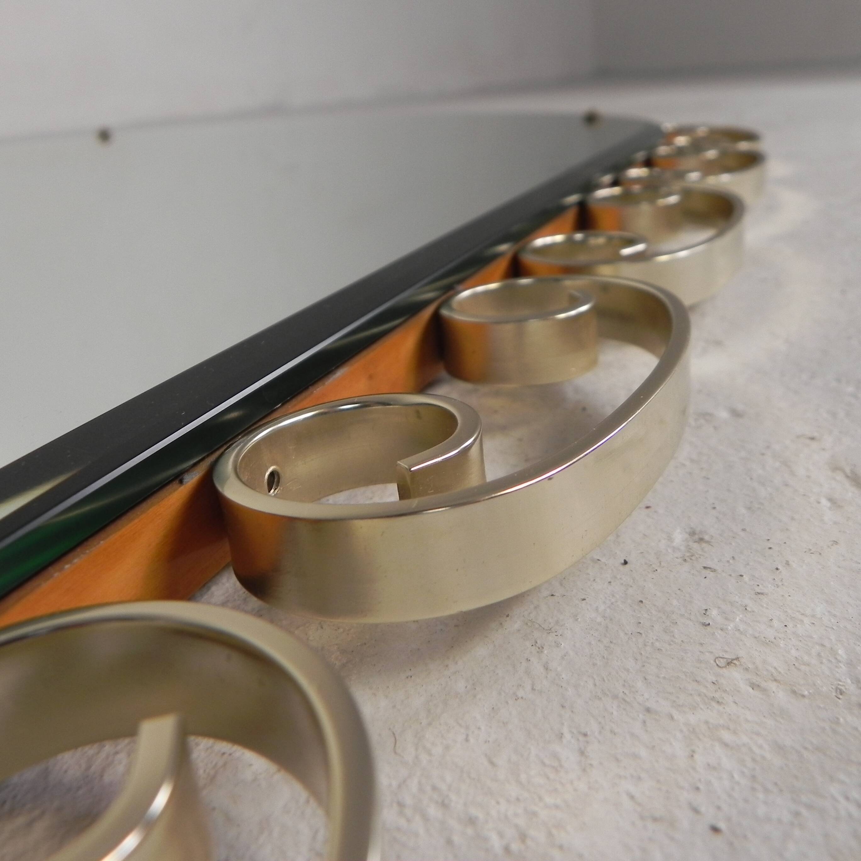 Vintage faceted mirror in an aluminium frame from the 1950s.