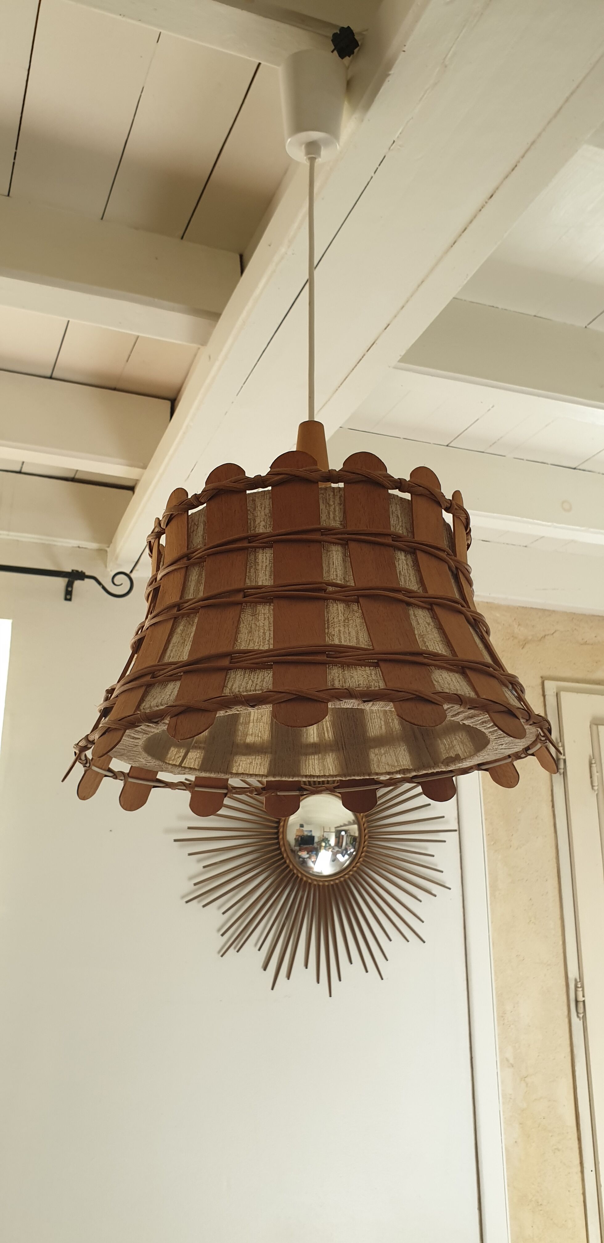 Rattan and wood suspension