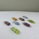 8 Murano knife rests