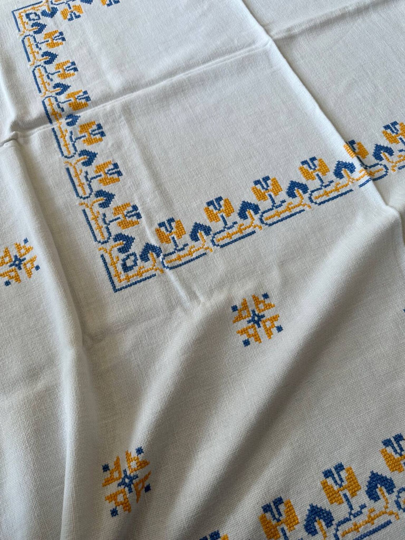 Embroidered white tablecloth