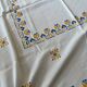 Embroidered white tablecloth