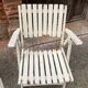 Five wooden garden armchairs
