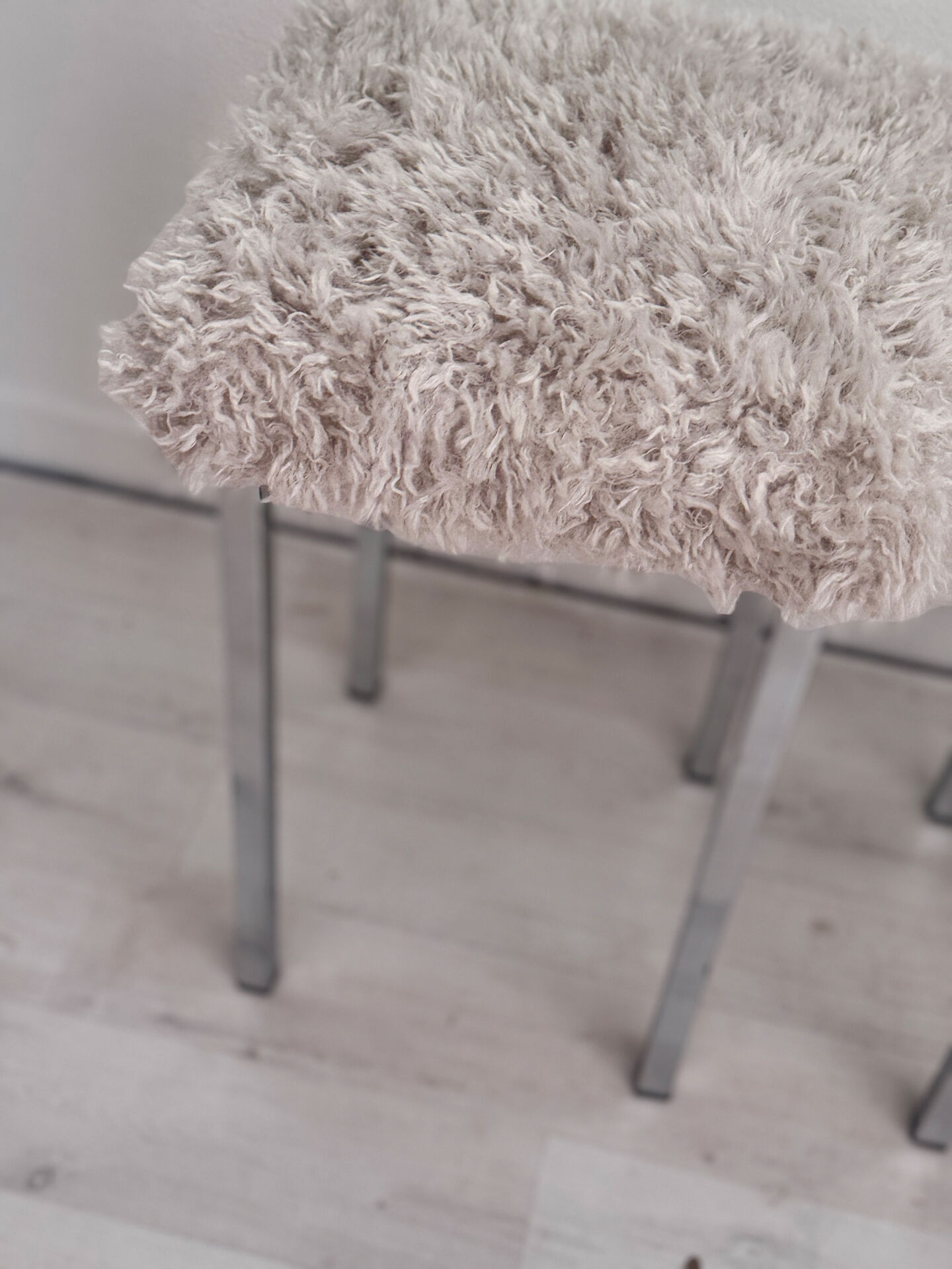 Set of two vintage chrome stools with fluffy upholstery
