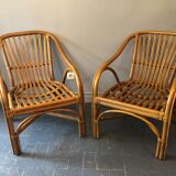 Duo of rattan armchairs with cushions