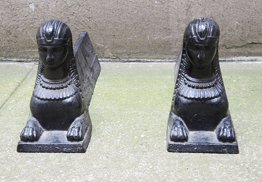 Old cast iron sphinx chenets
