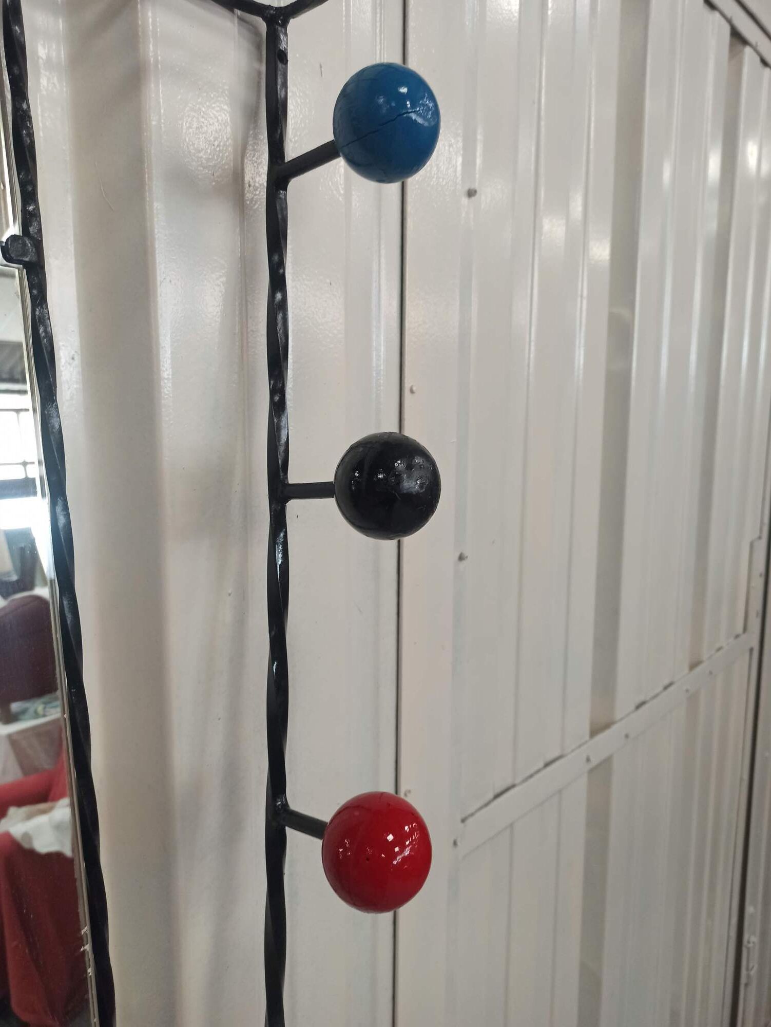 Iron cloakroom wall-mounted port multicolored balls mirror door umbrellas hats circa 50