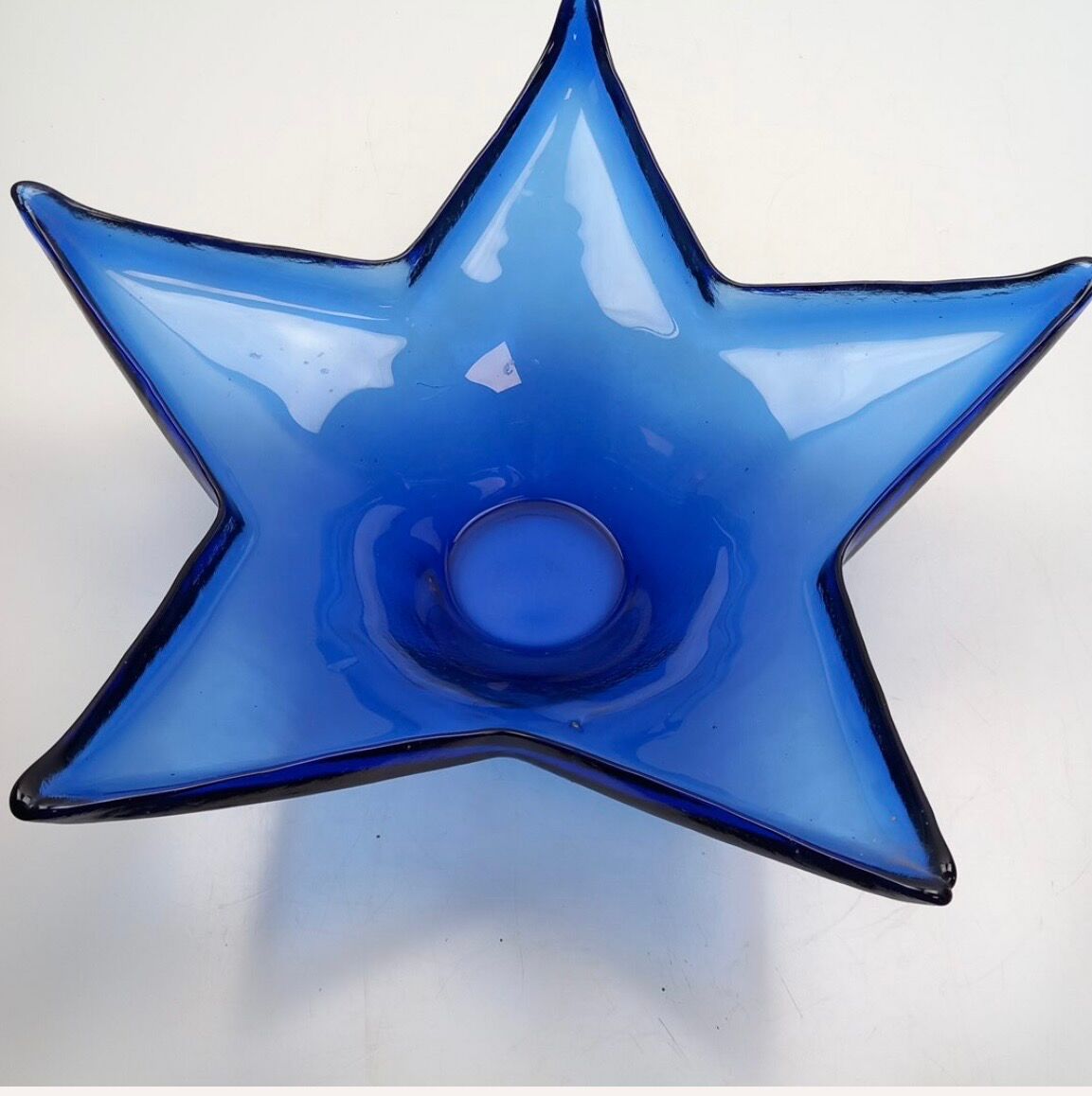 Vintage cobalt blue starfish-shaped fruit bowl in HSG style.