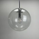 Large suspended lamp with a glass globe featuring bubbles by Peill & Putzler 1970.