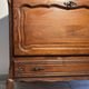 Louis XV style oak TV cabinet with drop-down flap.