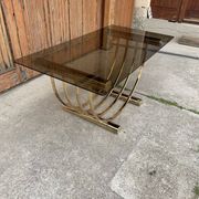 Dining table in brass and straw yellow glass, Regency style, 1970s.
