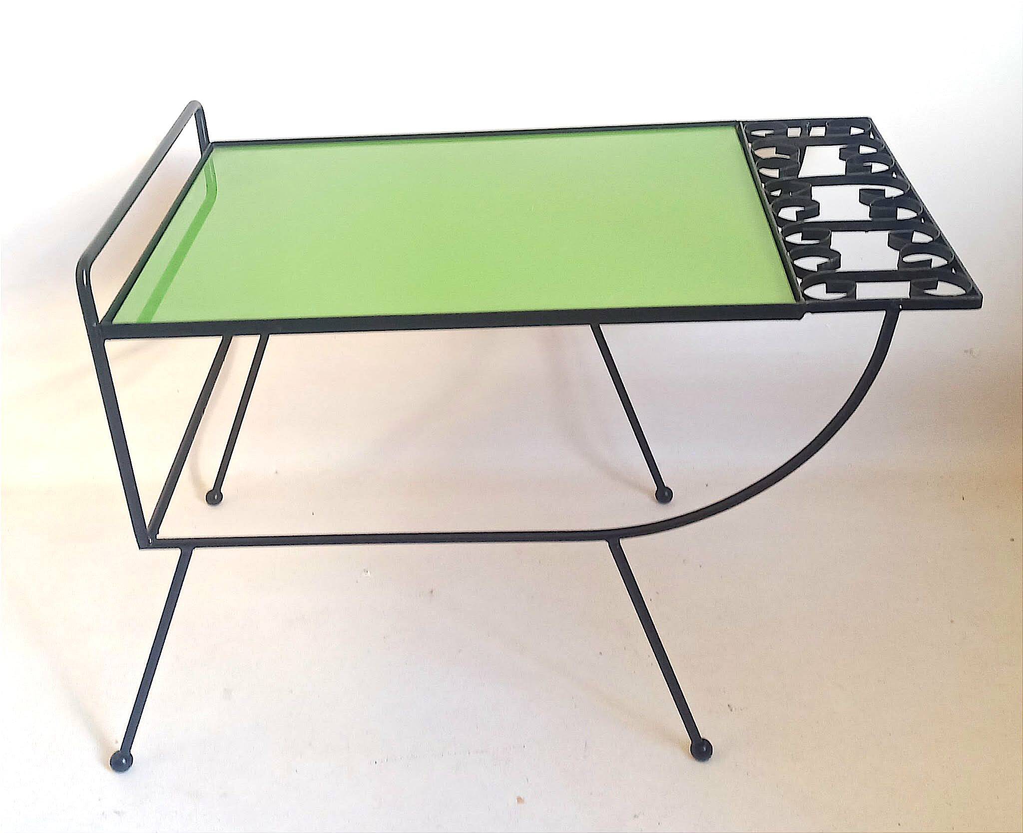 1960s side table with a lime green top, width 65.5 cm.