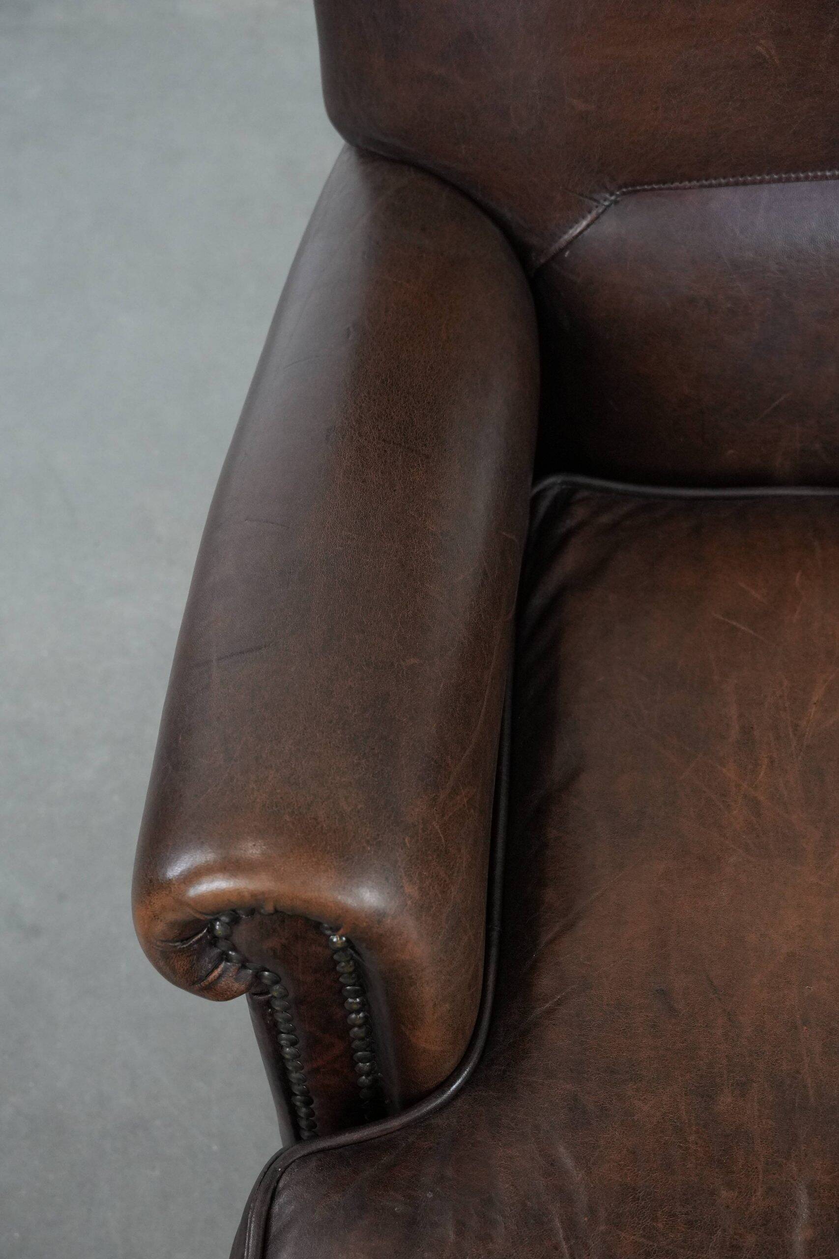 Beautiful Characterful Sheep Leather Armchair with a Deep Colour