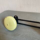 2 black and yellow metal wall coat racks