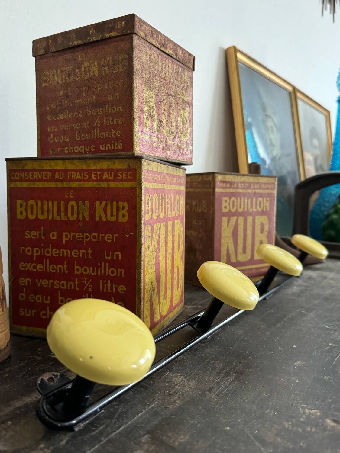 Wall coat rack with 4 vintage yellow metal hooks