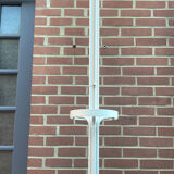 Vintage cylindrical coat rack with chrome hook