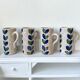 4 mugs stoneware flower decoration