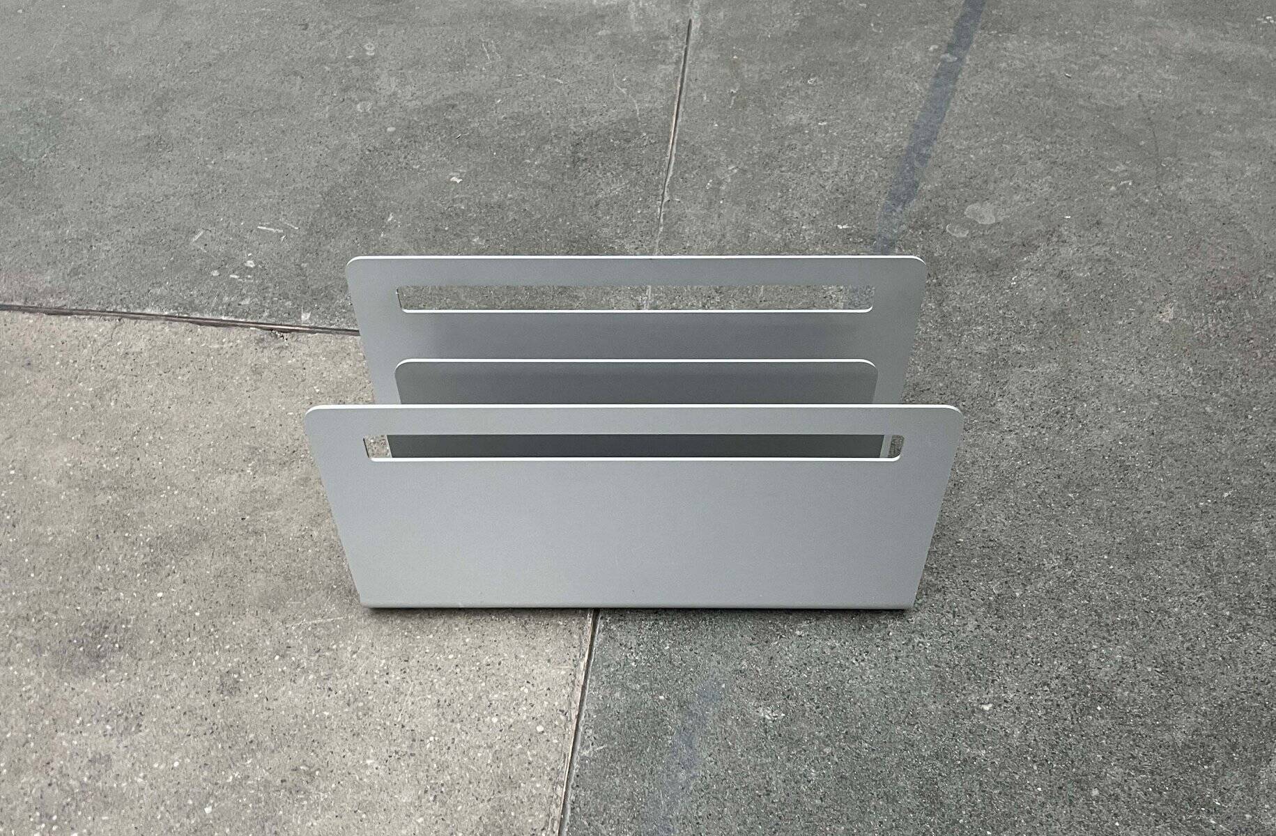 Minimalist aluminium magazine rack by Norman Foster for Helit, Germany, 1990s.