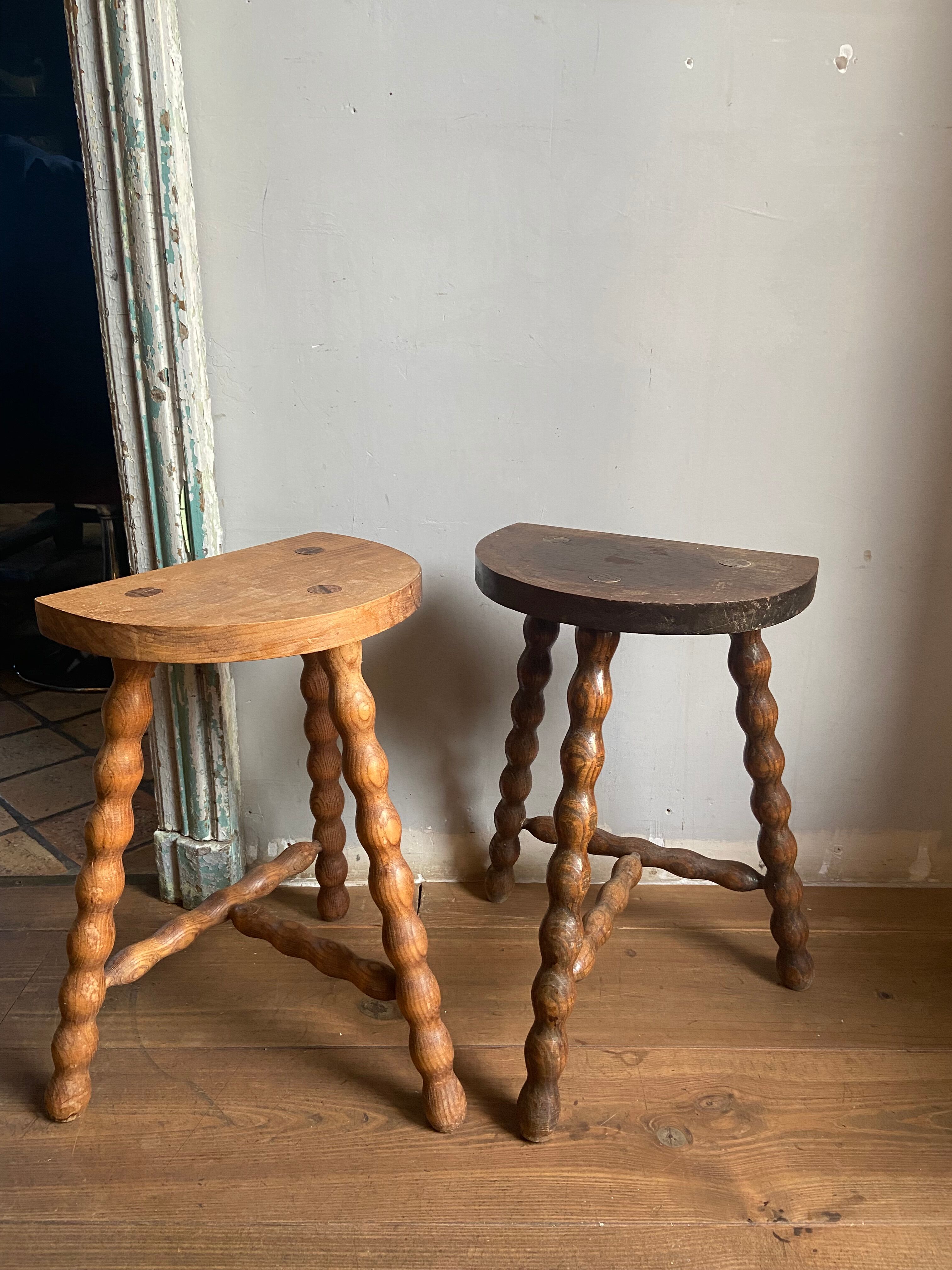 Pair of wooden milkman's stools turned brutalist